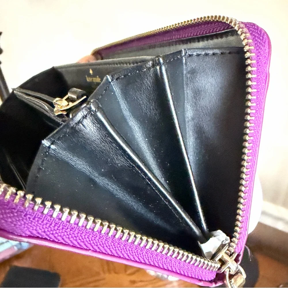 Kate Spade Fuchsia Metallic zip around wallet with Storybook Lining Rare find